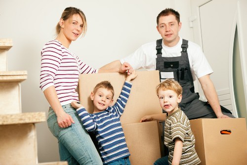 Professional team handling office furniture and equipment during a Manorpark relocation